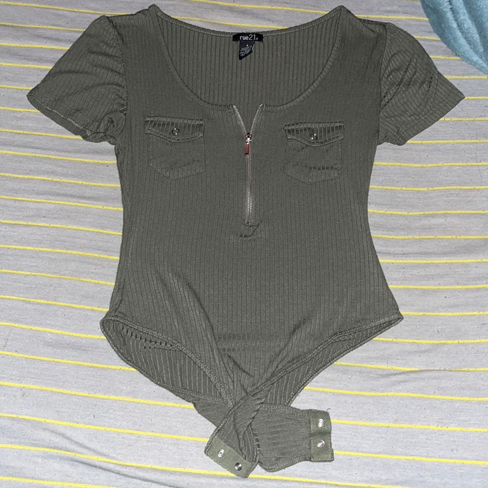 This is a green jumper/onesie from rue21:) It’s super comfy and so soft!!